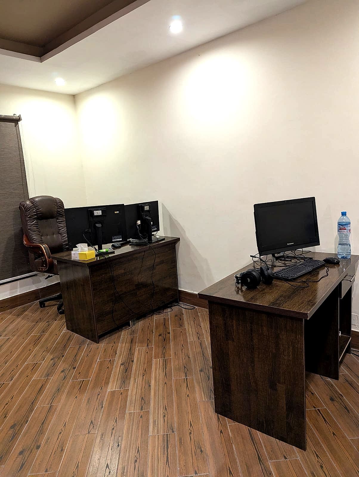Private office with dual-monitor workstations